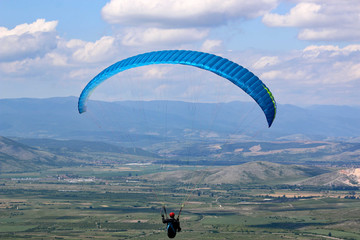 Paraglider flying from Brestovitsa in Bulgaria