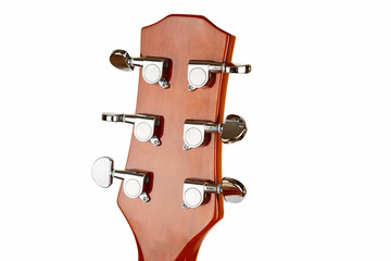 Acoustic guitar head on a white background, closeup