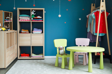 Stylish interior of children's dressing room