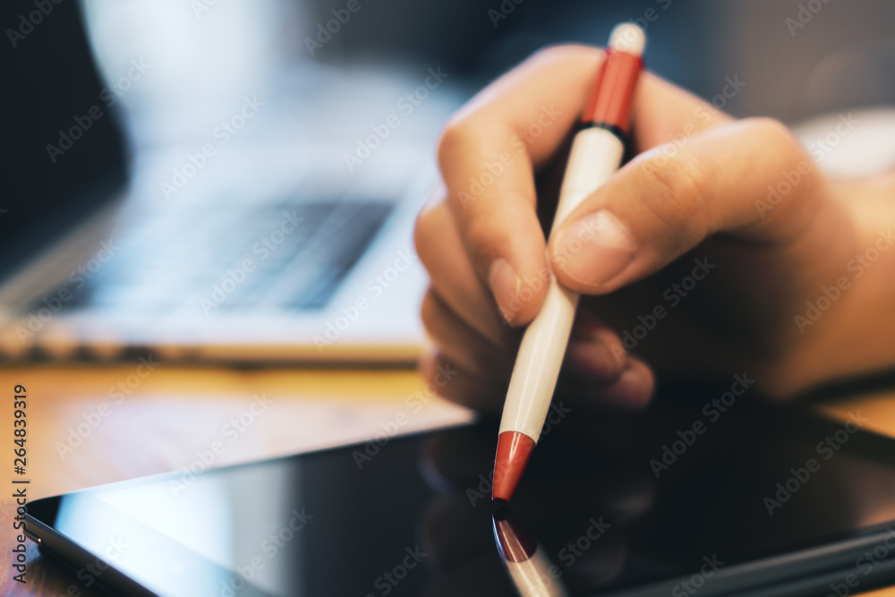Poster sideview of man hand using devices