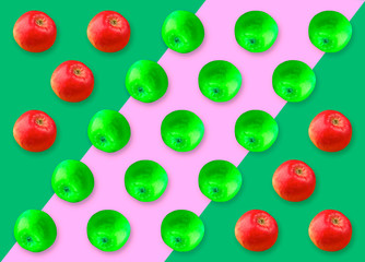 Colorful pattern of red and green apple. green and pink background
