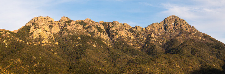 A panoramic view of the Santa Rita Mountains in evening light from Madera Canyon