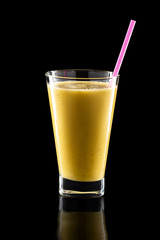Glass of fresh cold smoothies with straw isolated on black