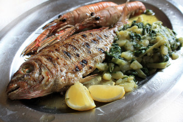 Langoustines grilled and red mullet,  sea bass grilled with lemon, potato and Mangel with olive oil.