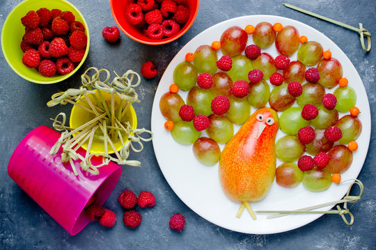 Peacock Fruit Berry Plate, Colorful Peacock Fruit Salad From Pear, Grapes And Raspberries, Fun Food Idea For Kids Party