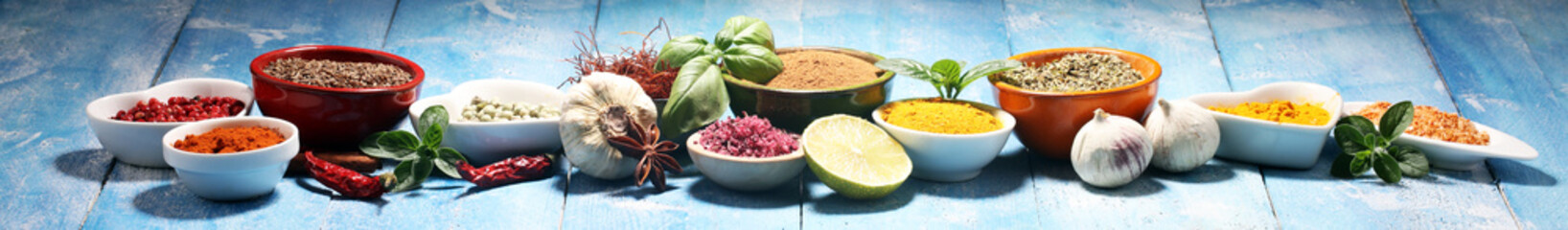 Spices and herbs variation on table. Food and cuisine ingredients.