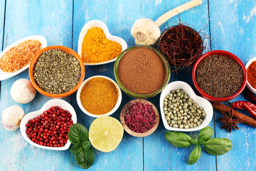 Spices and herbs variation on table. Food and cuisine ingredients.