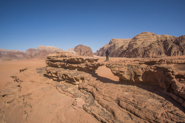 A beautiful day in the Jordanian desert of Wadi Rum. wide dessert with an amazing mountains and sand dunes , amazing scenery that you should see ! 