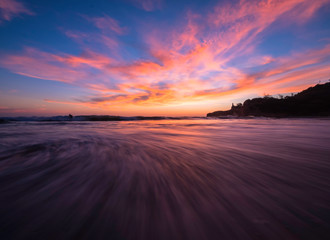 Fototapeta na wymiar Beautiful sunset scenery on the beach of Montanita Ecuador