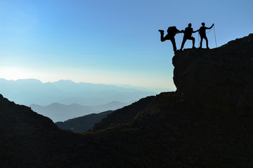 Risky cliffs and climbing struggle in high mountains