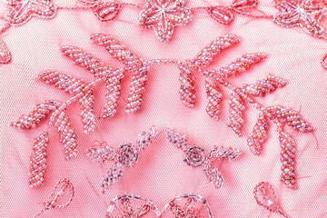 Fabric with sequins and sequins of bright colors. Fashion glitter fabric, sequins. Shiny surface