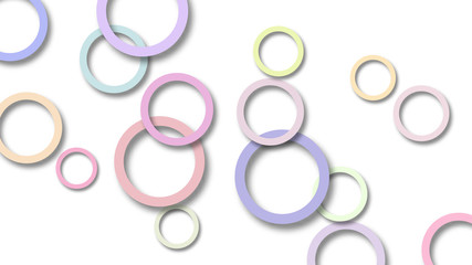 Abstract illustration of randomly arranged colored rings with soft shadows on white background