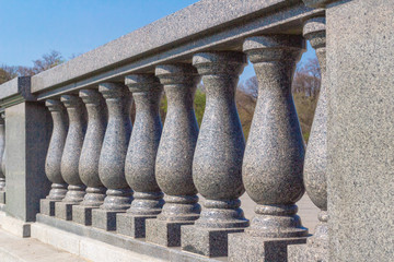 Fototapeta na wymiar Balusters and railings made of granite