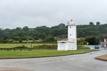 Fototapeta na wymiar Lighthouse in Le Becquet de Tourlaville is a village in Cherbourg-en-Cotentin. Manche , Normandy, France