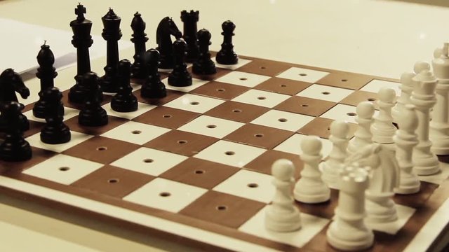 Tactile Chess Game, Chess Set for Visually Impaired (Blind) Players. Each Piece has a Peg that Inserts into the Board, allowing for Tactile Use of the Entire Board while Considering a Chess Move.