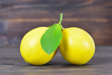 Lemons on wooden background