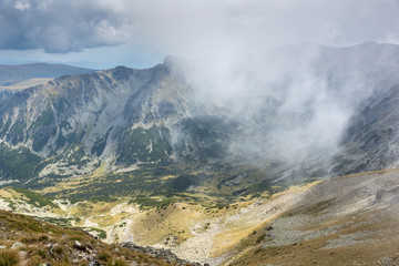 Amazing Panoramic view of hills covered with fog from Musala peak, Rila mountain, Bulgaria