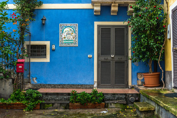Courtyard of a blue house in Catania, Sicily Island of Italy