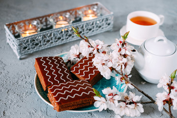 Sweet sunday dessert. Chocolate brownies with black tea.