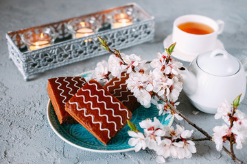 Sweet sunday dessert. Chocolate brownies with black tea.