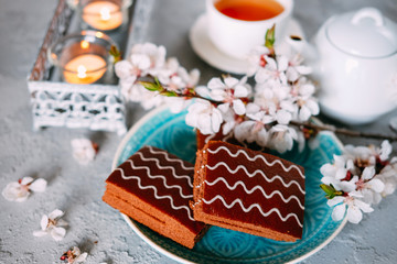 Sweet sunday dessert. Chocolate brownies with black tea.