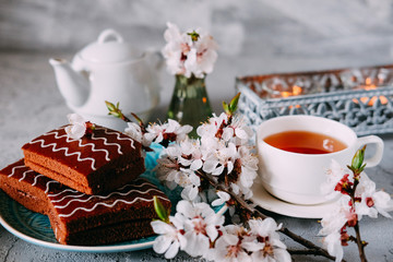 Sweet sunday dessert. Chocolate brownies with black tea.