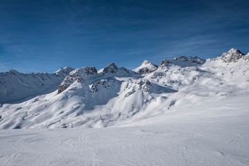 Fototapeta na wymiar Winter landscape in St. Moritz (German: Sankt Moritz; Italian: San Maurizio), a resort town in the Engadine valley in Switzerland
