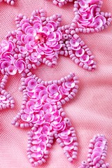 Fabric with sequins and sequins of bright colors. Fashion glitter fabric, sequins. Shiny surface