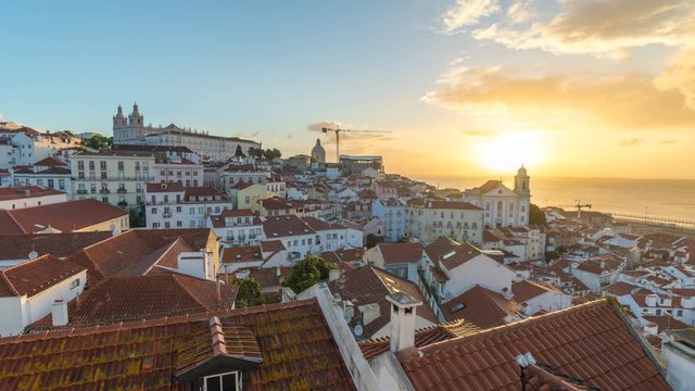 Lisbon Portugal time lapse 4K, aerial view city skyline night to day sunrise timelapse at Lisbon Alfama district