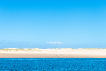 View over beautiful white sandy beach in Australia