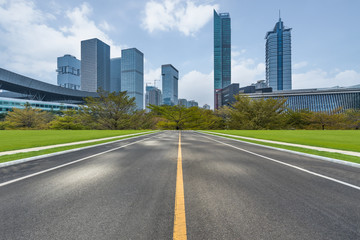 city road through modern buildings in Shenzhen