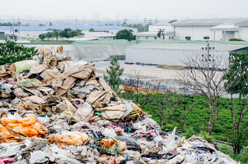 CHONBURI PROVINCE, THAILAND-JULY 13: Municipal waste disposal open dump process.  Dump site at Chonburi Province on JULY 13 , 2016 in CHONBURI PROVINCE THAILAND