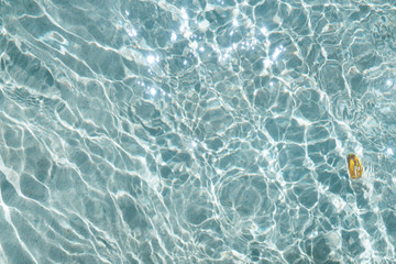 Textured blue water in the pool