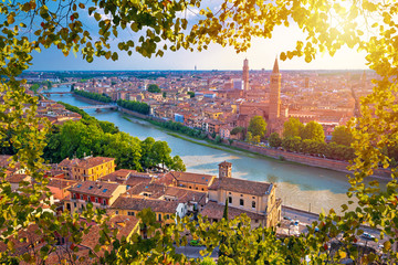 Ciy of Verona and Adige river aerial view through leaf frame - obrazy, fototapety, plakaty