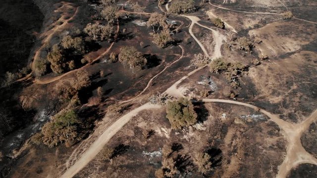 Aerial view of hills after the California Woosley wildfire