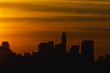 Fototapeta na wymiar The silhouette of building. Sunset view in City, Bangkok, Thailand