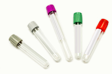 Top view of colorful blood tubes for keep and safe blood collection to checkup glucose and all virus on white background. Each colors caps used for keep different types of blood and liquid.