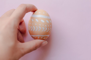 easter egg in hand