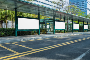 Blank billboard at bus stop in city of China.