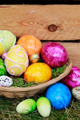 Wicker basket with Easter eggs.