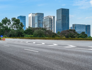 urban traffic road with cityscape in background, China.