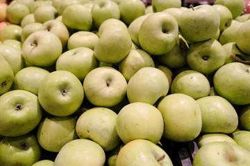 juicy and fresh apples background. Fruits at market