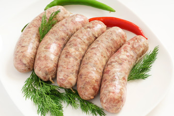 raw sausages with herbs
