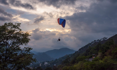 Paragliding in a picturesque valley, Uttarakhand, India