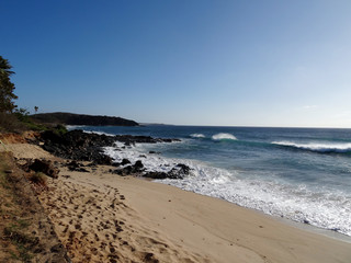 Fototapeta na wymiar Waves at Kepuhi Beach