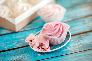 Beautiful delicious dessert. Zephyr in the shape of flowers roses.