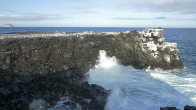Waves Breaking on Rocks In Galapagos Islands  Beautiful Shot of Galapagos Islands 