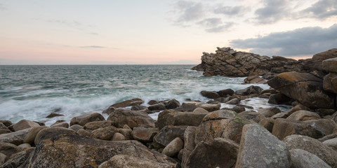 Panoramic view over the rocky Breton coast in the soft light of sunrise, France, Brittany, Finistere
