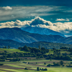 cloudy mountains and green valleys  landscape