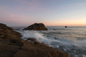 Fototapeta na wymiar Sunrise on the rocky coast of Brittany, France, Finistere